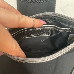 Calvin Klein wristlet. Chrome